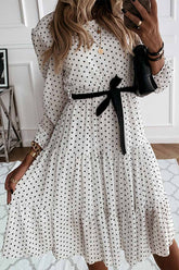 Elegante vestido midi con cuello redondo, lazo y estampado de lunares blancos y negros