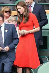 Vestido rojo anaranjado de Kate Middleton con corte A