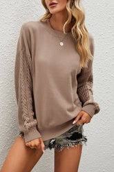 Suéter holgado con cuello redondo y mangas torcidas