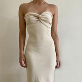 Butterscotch – Gestricktes Maxi-Tube-Kleid mit gedrehtem Knoten vorne