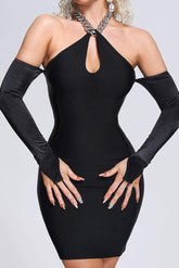 Vestido negro de fiesta con cuello halter y bandage