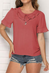 Blusa de gasa con cuello en V y mangas con volantes
