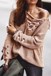 Suéter de rayas con cuello en V y lazos cruzados