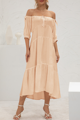 Elegante vestido de falda pastel con hombros descubiertos y frenillo dividido liso