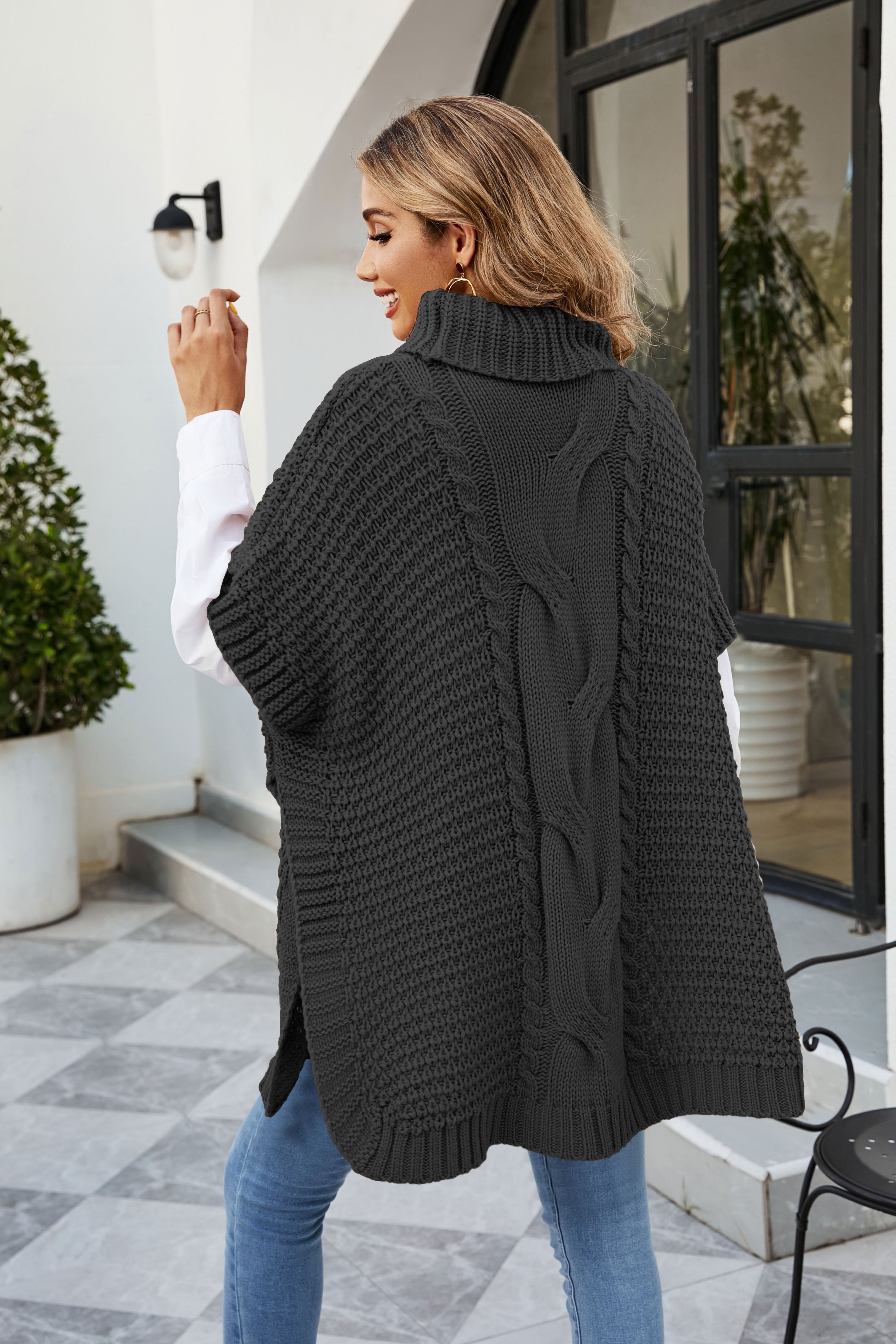Suéter de punto chal con cuello alto y giro