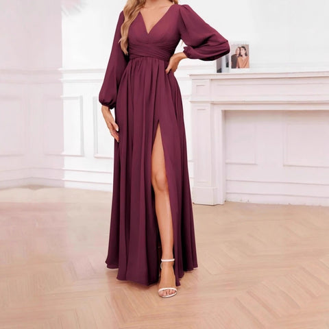 Vestido largo con cinturón, mangas abullonadas y botones
